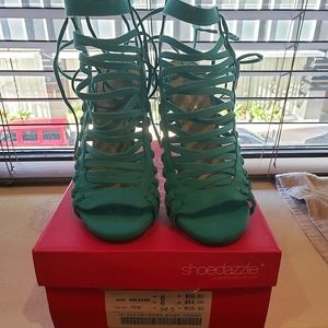 Teal strappy booties..